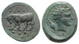 Sicily, Gela, c. 420-405 BC. Æ Tetras (17mm, 3.66g, 12h). Bull standing l., head lowered; three pellets in exergue. R/ Head of horned river god r.; ba...