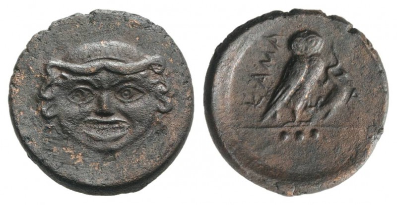 Sicily, Kamarina, c. 420-405 BC. Æ Tetras (18mm, 3.47g, 12h). Facing gorgoneion....