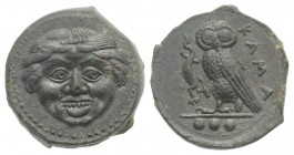 Sicily, Kamarina, c. 420-405 BC. Æ Tetras (13mm, 3.42g, 6h). Gorgoneion. R/ Owl standing l., head facing, holding lizard in talon. CNS III, 21; SNG AN...