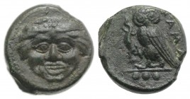 Sicily, Kamarina, c. 420-405 BC. Æ Tetras (12.5mm, 2.92g, 6h). Gorgoneion. R/ Owl standing l., head facing, holding lizard in talon. CNS III, 21; SNG ...