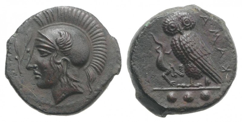 Sicily, Kamarina, c. 420-410 BC. Æ Tetras (15mm, 3.52g, 1h). Head of Athena l., ...
