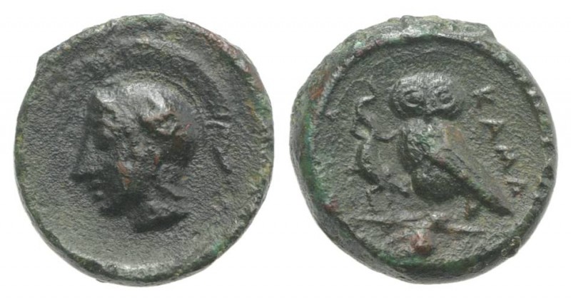 Sicily, Kamarina, c. 410-405 BC. Æ Onkia (10mm, 1.19g, 12h). Helmeted head of At...