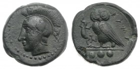 Sicily, Kamarina, c. 420-410 BC. Æ Tetras (13.5mm, 3.07g, 6h). Head of Athena l., wearing crested Corinthian helmet. R/ Owl standing l., grasping liza...