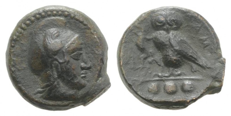 Sicily, Kamarina, c. 420-405 BC. Æ Tetras (14mm, 2.95g, 3h). Head of Athena r., ...