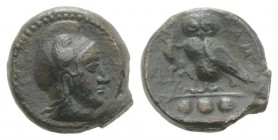 Sicily, Kamarina, c. 420-405 BC. Æ Tetras (14mm, 2.95g, 3h). Head of Athena r., wearing Phrygian helmet. R/ Owl standing l., head facing, grasping liz...