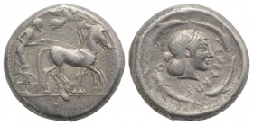 Sicily, Syracuse, c. 485-466 BC. AR Tetradrachm (25mm, 17.44g, 12h), c. 480-470 BC. Charioteer driving quadriga r.; above, Nike flying r., crowning ho...