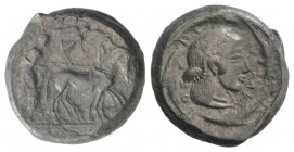 Sicily, Syracuse, c. 485-466 BC. AR Tetradrachm (24mm, 17.10g, 11h), c. 480-470 BC. Charioteer driving quadriga r.; above, Nike flying r., crowning ho...
