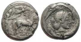 Sicily, Syracuse. Hieron I (478-466 BC). AR Tetradrachm (23mm, 17.61g, 8h), c. 478-475 BC. Charioteer driving quadriga r.; above, Nike flying r., crow...