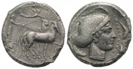 Sicily, Syracuse, 466-405 BC. AR Tetradrachm (26mm, 16.70g, 6h), c. 430 BC. Charioteer driving quadriga r.; above, Nike flying r., crowning horses. R/...