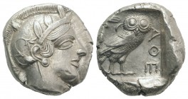 Attica, Athens, c. 454-404 BC. AR Tetradrachm (25mm, 17.22g, 1h). Helmeted head of Athena r. R/ Owl standing r., head facing; olive sprig behind; all ...