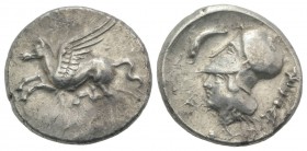 Corinth, c. 400-375 BC. AR Stater (23mm, 8.57g, 6h). Pegasos flying l. R/ Helmeted head of Athena l.; dolphin above, thymiaterion to r. Pegasi 324. VF...