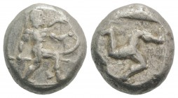 Pamphylia, Aspendos, c. 465-430 BC. AR Stater (18mm, 10.89g). Warrior, nude but for helmet, holding sword and shield, advancing r. R/ Triskeles within...