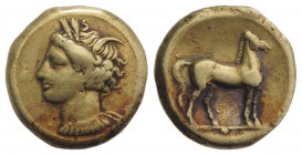 Carthage, c. 320-310 BC. EL Stater (19mm, 7.43g, 12h). Head of Tanit l., wearing wreath of grain ears; pellet before. R/ Horse standing r.; pellet bel...