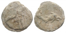 Roman PB Tessera, c. 1st century BC - 1st century AD (18mm, 4.18g, 12h). Apollo standing l., holding arrow and leaning on bow. R/ Dolphin r. Near VF
