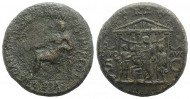 Gaius (Caligula, 37-41). Æ Sestertius (35mm, 28.00g, 6h). Rome, 37-8. Pietas, veiled and draped, seated l., holding patera and resting arm on small dr...