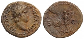 Nero (54-68). Æ As (29mm, 9.94g, 6h). Rome, c. AD 65. Laureate head r. R/ Victory flying l., holding shield inscribed S P Q R. RIC I 312. Brown patina...