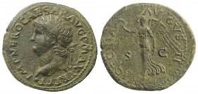 Nero (54-68). Æ Dupondius (31mm, 12.46g, 6h). Lugdunum, c. AD 66. Laureate head l., globe at point of neck. R/ Victory advancing l., holding wreath an...