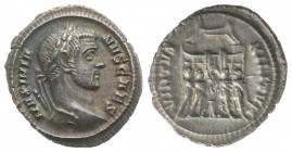 Galerius (Caesar, 293-305). AR Argenteus (19mm, 3.36g, 6h). Rome, c. AD 294. Laureate head r. R/ The four tetrarchs sacrificing over tripod before cit...