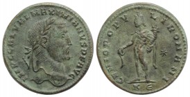 Galerius (305-311). Æ Follis (26mm, 8.55g, 6h). Cyzicus, AD 307. Laureate head r. R/ Genius standing l., holding patera and cornucopiar; star//KЄ. RIC...