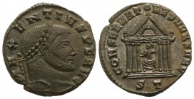 Maxentius (307-312). Æ Follis (24mm, 5.99g, 6h). Ticinum, 307-8. Laureate head r. R/ Roma seated facing, head l., in hexastyle temple, holding globe a...