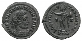 Constantine I (307/310-337). Æ Follis (21mm, 2.86g, 6h). Londinium, 313-4. Laureate and cuirassed bust r. R/ Sol standing l., extending arm and holdin...