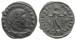 Constantine I (307/310-337). Æ Follis (19mm, 3.12g, 6h). Treveri, AD 317. Laureate, draped and cuirassed bust r. R/ Sol standing l., raising hand and ...
