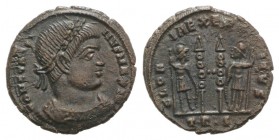 Constantine I (307-337). Æ Follis (17mm, 2.17g, 6h). Treveri, 332-3. Laureate, draped and cuirassed bust r. R/ Two soldiers flanking two standards; TR...
