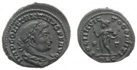 Constantine I (307-337). Æ Follis (24mm, 5.04g, 12h). Lugdunum, c. 309-310. Laureate, draped and cuirassed bust r. R/ Sol advancing l., extending arm ...