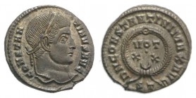 Constantine I (307/310-337). Æ Follis (18mm, 2.86g, 12h). Ticinum, 322-5. Laureate head r. R/ Laurel-wreath enclosing VOT/•/XX-crescent//ST. RIC VII 1...