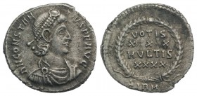 Constantius II (337-361). AR Siliqua (18mm, 2.02g, 6h). Sirmium, 351-5. Pearl-diademed, draped and cuirassed bust r. R/ VOTIS/XXX/MVLTIS/XXXX in four ...