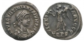 Valentinian II (375-392). AR Siliqua (17mm, 1.72g, 6h). Treveri, 375-383. Pearl-diademed, draped and cuirassed bust r. R/ Victory advancing l., holdin...
