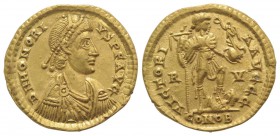 Honorius (393-423). AV Solidus (21mm, 4.44g, 12h). Ravenna, 402-6. Pearl-diademed, draped and cuirassed bust r. R/ Honorius standing r., spurning capt...