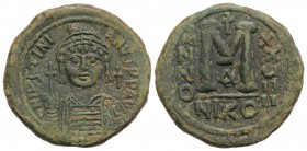 Justinian I (527-565). Æ 40 Nummi (34mm, 17.07g, 7h). Nicomedia, year 29 (555/6). Helmeted and cuirassed facing bust, holding globus cruciger and shie...