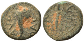 UNCERTAIN. Trajan, 98-117. Ae (bronze, 1.76 g, 12 mm). IMP TRA Thunderbolt. Rev. AVG DAC Cornucopia. RPC III 6544. Fine. Rare.