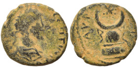 MESOPOTAMIA. Carrhae. Elagabalus, 218-222. Ae (bronze, 1.51 g, 13 mm). Laureate, draped and cuirassed bust of Elagabalus to right. Rev. Large crescent...