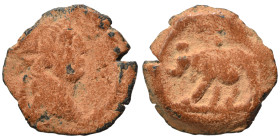 EGYPT. Alexandria. Trajan, 98-117. Chalkous (bronze, 1.10 g, 12 mm). Laureate head of Trajan to right. Rev. Elephant or rhinoceros walking left. RPC I...