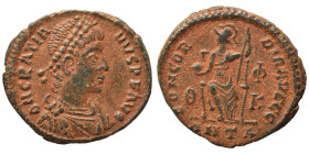 Gratian, 367-383. Ae (bronze, 2.48 g, 19 mm). Antioch. D N GRATI-ANVS AVG Diademed, draped and cuirassed bust of Gratian right. Rev. Roma seated facin...