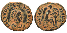 Aelia Eudoxia, 400-404. Follis (bronze, 2.07 g, 15 mm), Antioch. AEL EVDOXIA AVG diademed and draped bust right, being crowned manus Dei above. Rev. S...