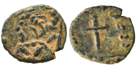 Theodosius II, 402-450. Nummus (bronze, 0.66 g, 9 mm), contemporary imitation. Diademed, draped and cuirassed bust left. Rev. Cross within wreath. Nea...