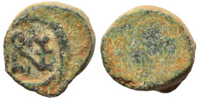 Uncertain. Ae (bronze, 2.49 g, 10 mm). Blank [Pearl-diademed, draped and cuirassed bust right]. Rev. Monogram. Fine.