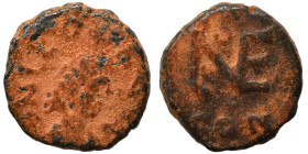 Leo I, 457-474. Nummus (bronze, 1.10 g, 10 mm), Constantinople. Bust of Leo I, pearl-diademed, draped, cuirassed, right. Monogram of Leo within wreath...