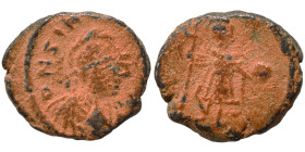 Zeno, 476-491. Nummus (bronze, 0.98 g, 11 mm), uncertain mint. Helmeted, draped and cuirassed bust right. Rev. Zeno standing front, holding standard i...