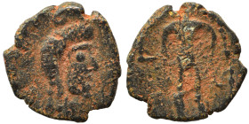 Barbaric imitation of Roman folles. Ae (bronze, 0.52 g, 10 mm). Bare-headed bust right. Rev. Uncertain figure standing, facing. Nearly very fine.