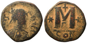 Justin I, 518-527. Follis (bronze, 17.23 g, 30 mm), Eastern imitation. Diademed, draped, and cuirassed bust right. Rev. Large M; cross above, star to ...