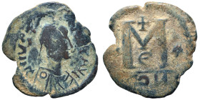 Justin I, 518-527. Follis (bronze, 8.50 g, 32 mm), Eastern imitation. Diademed, draped, and cuirassed bust right. Rev. Large M; cross above, star to l...