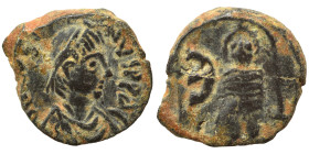 Justin I, 518-527. Pentanummium (bronze, 1.44 g, 13 mm), Theoupolis (Antioch). Diademed, draped and cuirassed bust of Justin I to right. Rev. Tyche of...