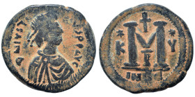 Justin I, 518-527. Follis (bronze, 16.09 g, 30 mm), Cyzicus. D N IVSTINVS P P AVC Diademed and draped bust to right. Rev. Large M between K - Y; stars...