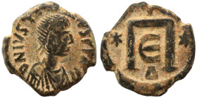 Justin I, 518-527. Pentanummium (bronze, 2.49 g, 14 mm), uncertain mint (Constantinople?). D N IVSTINVS P P AV Diademed, draped and cuirassed bust of ...
