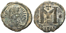 Justinian I, 527-565. Follis (bronze, 12.97 g, 30 mm), Theoupolis (Antioch). DN IVSTINIANVS PP AVC Pearl diademed, draped, cuirassed bust right. Rev. ...