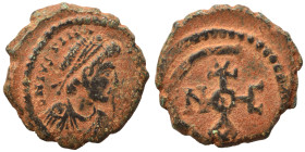 Justinian I, 527-565. Pentanummium (bronze, 2.01 g, 15 mm), Theoupolis (Antioch). D N IVSTINI-ANVS PP AV Diademed, draped, and cuirassed bust of Justi...